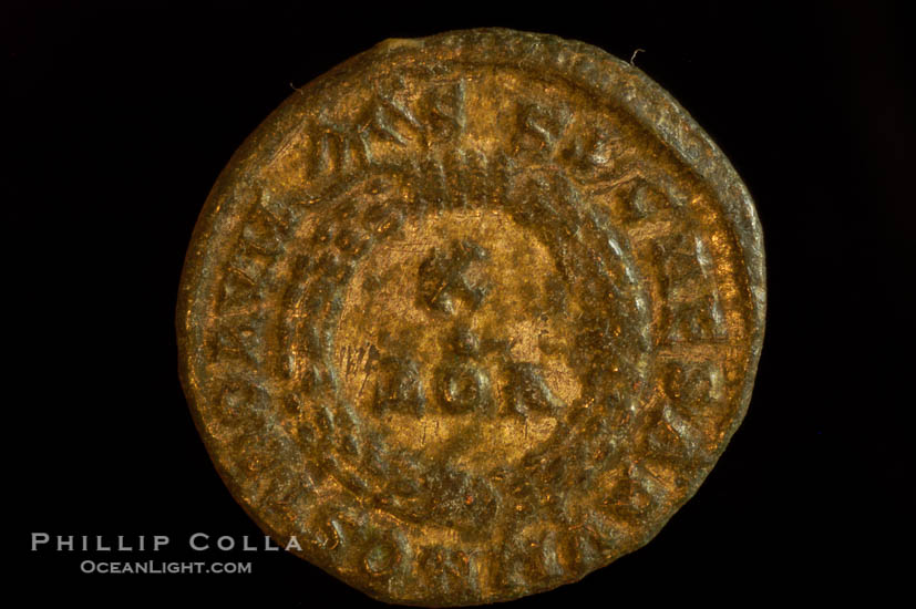 Roman emperor Crispus (316-326 A.D.), depicted on ancient Roman coin (bronze, denom/type: AE3) (AE3. Reverse: C, AESRVM NOSTRORVM. Wreath enclosing VOT V.)., natural history stock photograph, photo id 06696