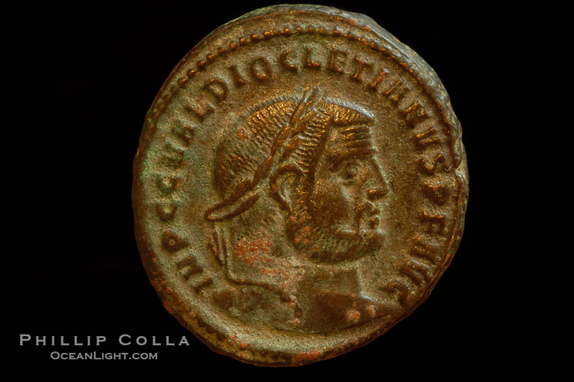 Roman emperor Diocletian (285-305 A.D.), depicted on ancient Roman coin (bronze, denom/type: Follis) (Follis, VF, 30mm, Sear 3533 var.. Obverse: IMP C C VAL DIOCLETIANVS P F AVG. Reverse: GENIO POPVLI ROMANI HTA exergue.)., natural history stock photograph, photo id 06830