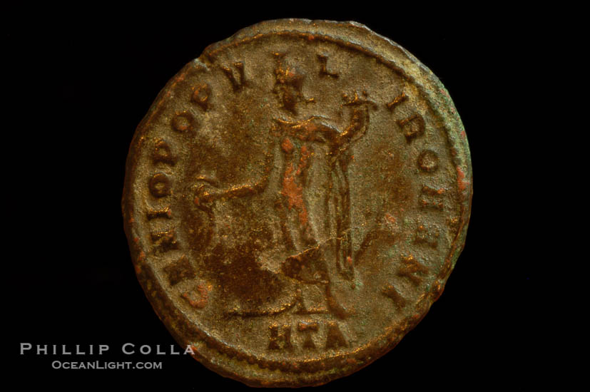 Roman emperor Diocletian (285-305 A.D.), depicted on ancient Roman coin (bronze, denom/type: Follis) (Follis, VF, 30mm, Sear 3533 var.. Obverse: IMP C C VAL DIOCLETIANVS P F AVG. Reverse: GENIO POPVLI ROMANI HTA exergue.)., natural history stock photograph, photo id 06832