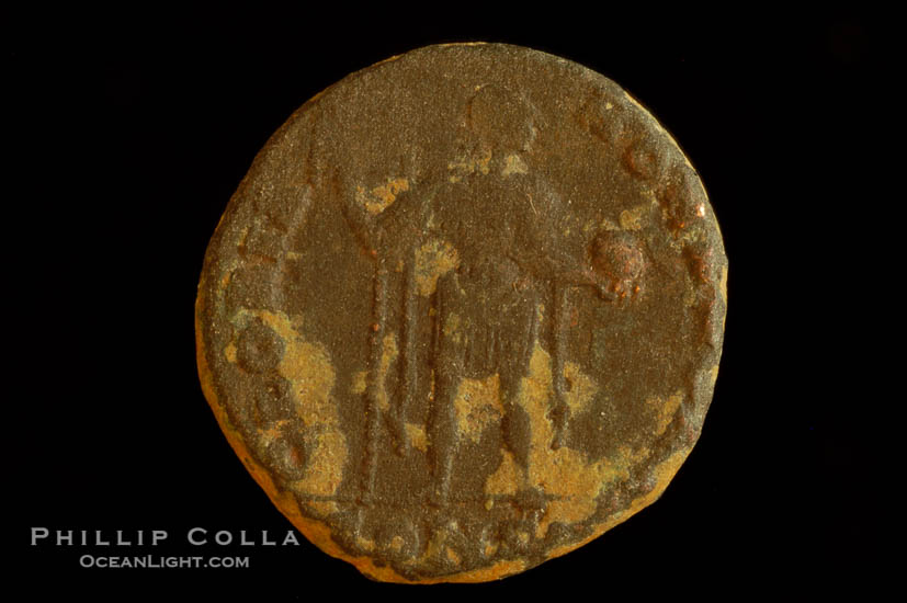 Roman emperor Honorius (393-423 A.D.), depicted on ancient Roman coin (bronze, denom/type: AE2) (AE2. Obverse: D.N.HONORIUS.PF.AVG. Reverse: GLORIA.ROMAN.ORVM. Honorius standing, facing right holding standard and globe.)., natural history stock photograph, photo id 06740