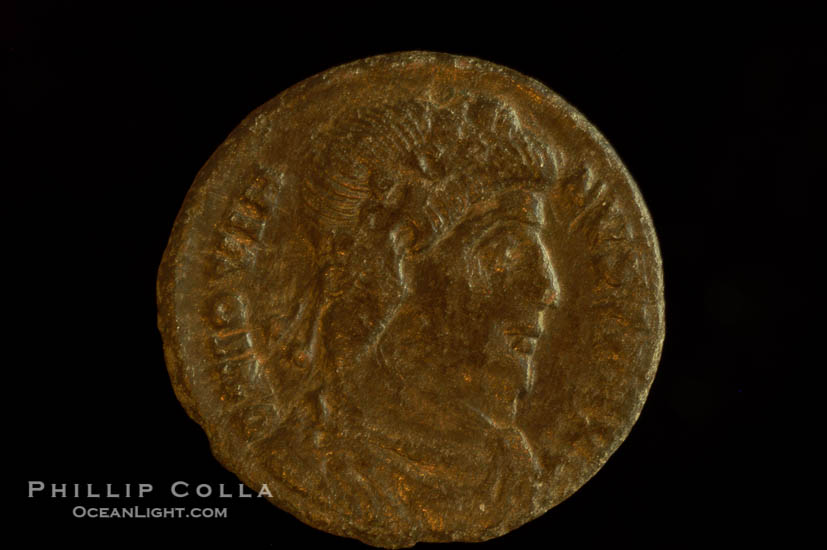 Roman emperor Jovian (363-364 A.D.), depicted on ancient Roman coin (bronze, denom/type: AE3) (AE3. nVF. Reverse: legend in wreath VOT V MVLT X.3.)., natural history stock photograph, photo id 06718