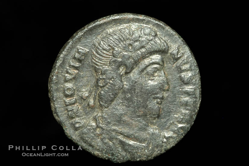 Roman emperor Jovian (363-364 A.D.), depicted on ancient Roman coin (bronze, denom/type: AE3) (AE3. nVF. Reverse: legend in wreath VOT V MVLT X.3.)., natural history stock photograph, photo id 06719