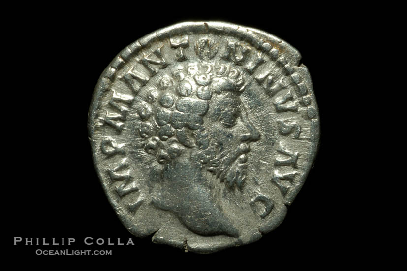 Roman emperor Marcus Aurelius (161-180 A.D.), depicted on ancient Roman coin (silver, denom/type: Denarius) (Denarius, VF, 3.2 g.. Obverse: IMP M ANTONINVS AVG. Reverse: CONCORD AVG IMP XVII, COX III exergue.)., natural history stock photograph, photo id 06560