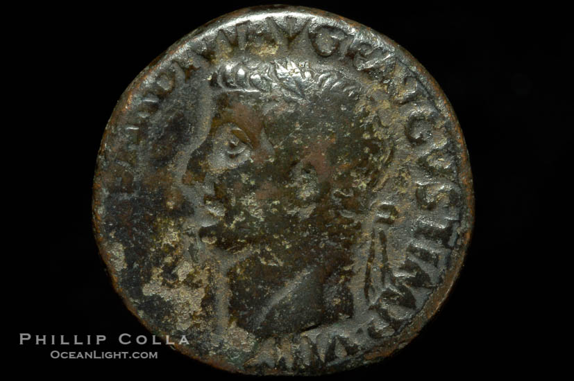 Roman emperor Tiberius (14-37 A.D.), depicted on ancient Roman coin (bronze, denom/type: As) (As, F; Winged caduceus.)., natural history stock photograph, photo id 06778