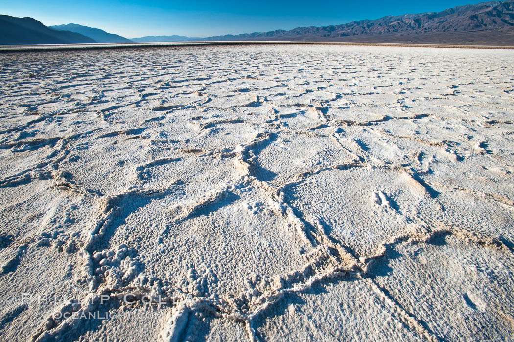 Devils Golf Course, California.  Evaporated salt has formed into gnarled, complex crystalline shapes in on the salt pan of Death Valley National Park, one of the largest salt pans in the world.  The shapes are constantly evolving as occasional floods submerge the salt concretions before receding and depositing more salt. USA, natural history stock photograph, photo id 15615