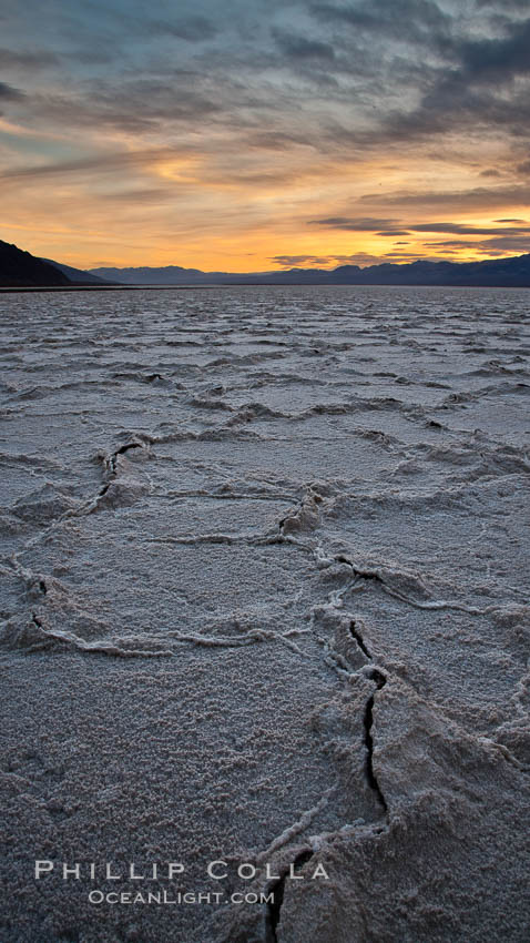 Image 27635, Salt polygons. After winter flooding, the salt on the Badwater Basin playa dries into geometric polygonal shapes. Death Valley National Park, California, USA, Phillip Colla, all rights reserved worldwide. Keywords: arid, badwater, california, death valley, death valley national park, desert, dry, environment, harsh, landscape, national parks, nature, outdoor, outdoors, outside, playa, polygon, salt, salt polygon, scene, scenery, scenic, usa.