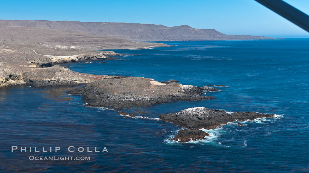San Clemente Island, rugged barren coastline and island terrain surrounded by lush underwater kelp forests and marine life. California, USA, natural history stock photograph, photo id 26012