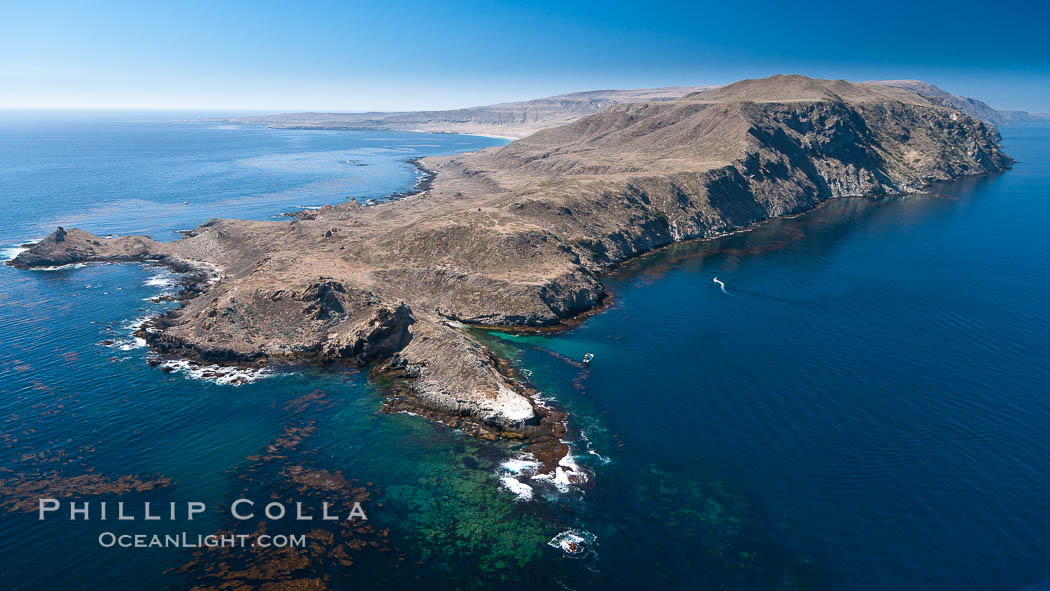 San Clemente Island Pyramid Head, the distinctive pyramid shaped southern end of the island.  San Clemente Island Pyramid Head, showing geologic terracing, underwater reefs and giant kelp forests. California, USA, natural history stock photograph, photo id 26003