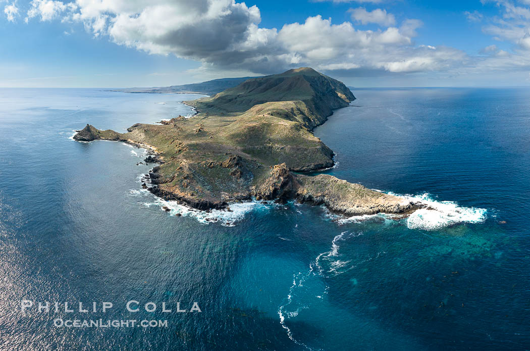 San Clemente Island aerial photo, Pyramid Head and Balanced Rock at the southern end of the island.  San Clemente Island Pyramid Head, the distinctive pyramid shaped southern end of the island, exhibits distinctive geologic terracing, underwater reefs and giant kelp forests