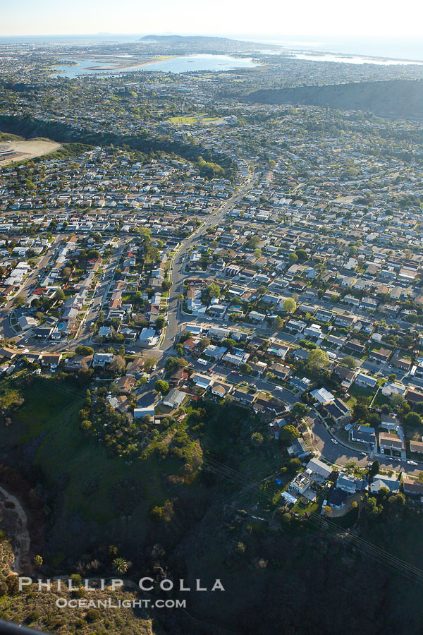 Housing development in San Diego goes right up to the edge of the mesa and stops where the canyon begins., natural history stock photograph, photo id 22413