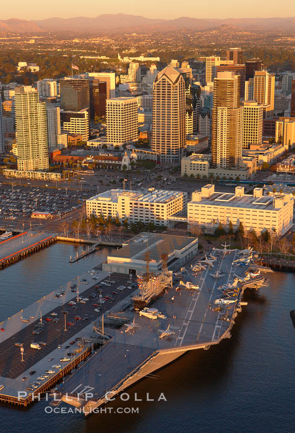 Downtown San Diego and USS Midway.  The USS Midway was a US Navy aircraft carrier, launched in 1945 and active through the Vietnam War and Operation Desert Storm, as of 2008 a museum along the downtown waterfront in San Diego. California, USA, natural history stock photograph, photo id 22348