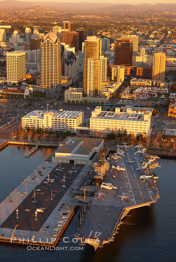 Downtown San Diego and USS Midway.  The USS Midway was a US Navy aircraft carrier, launched in 1945 and active through the Vietnam War and Operation Desert Storm, as of 2008 a museum along the downtown waterfront in San Diego. California, USA, natural history stock photograph, photo id 22429