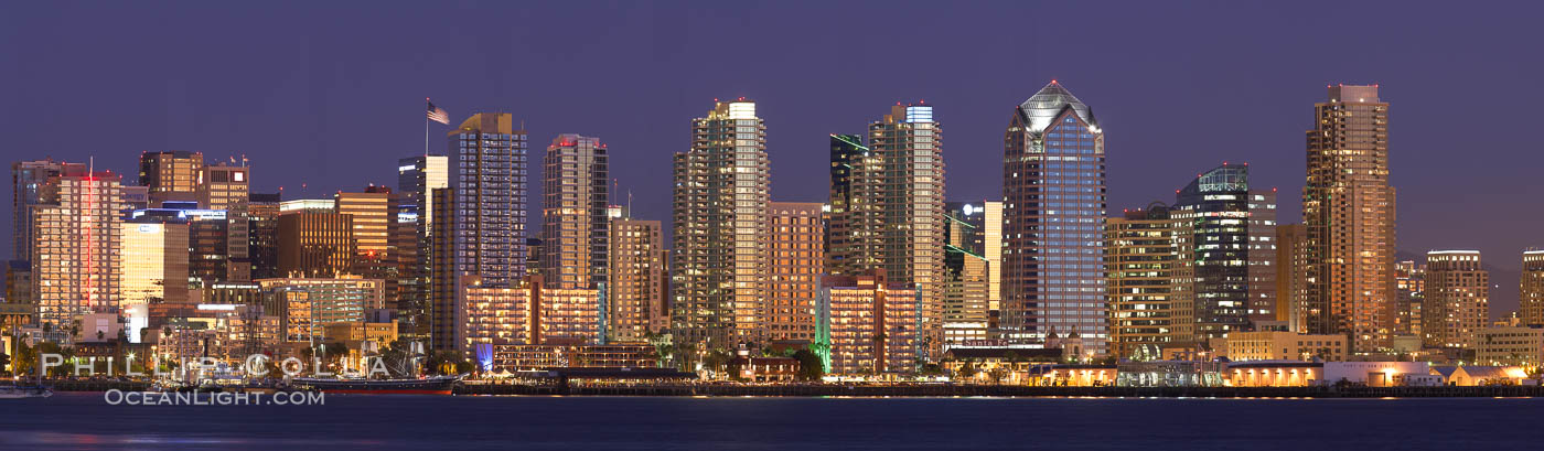 San Diego city skyline at sunset, showing the buildings of downtown San Diego rising above San Diego Harbor, viewed from Harbor Island.  A panoramic photograph, composite of thirteen separate images. California, USA, natural history stock photograph, photo id 22255