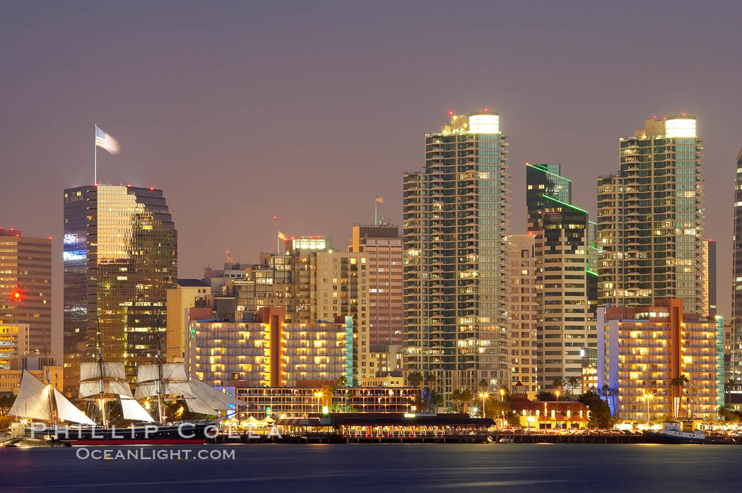 San Diego city skyline at dusk, viewed from Harbor Island, the Star of India at left. California, USA, natural history stock photograph, photo id 14529