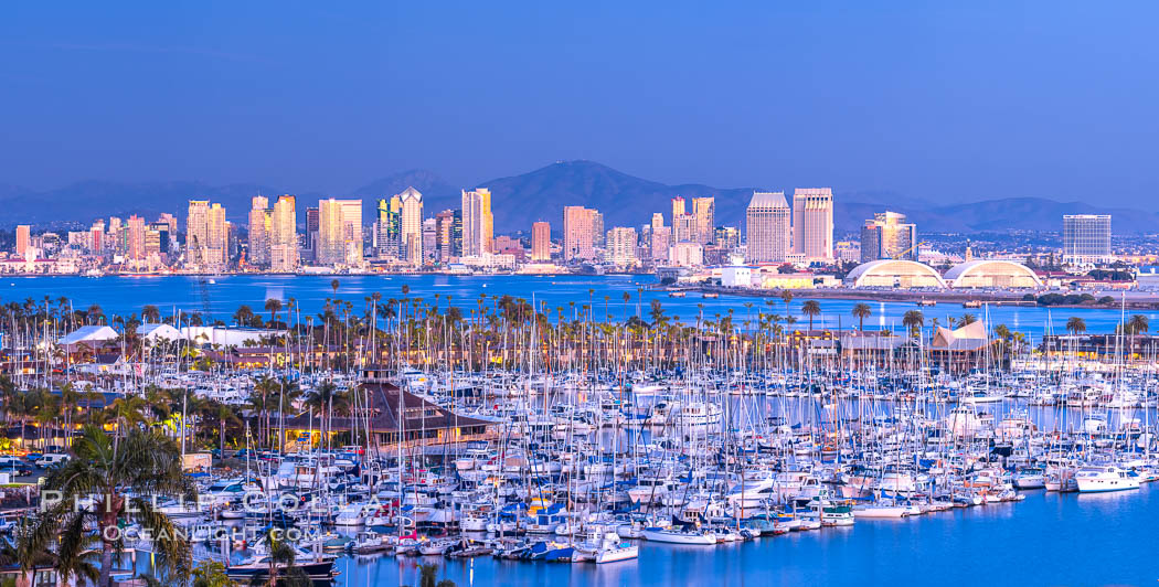 San Diego City Skyline at Sunset, viewed from Point Loma, Shelter Island Yacht Club in the foreground, San Diego Bay, Mount San Miguel (right) and Lyons Peak (left) in distance, panoramic photograph. California, USA, natural history stock photograph, photo id 36750