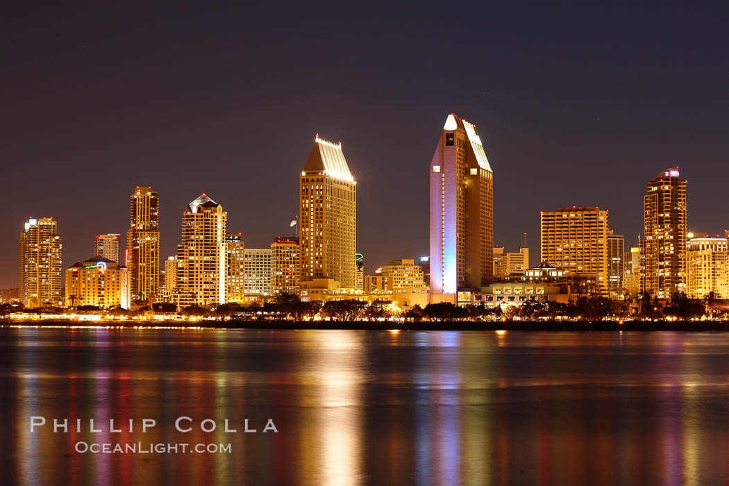San Diego city skyline at night, showing the buildings of downtown San Diego reflected in the still waters of San Diego Harbor, viewed from Coronado Island. California, USA, natural history stock photograph, photo id 22259