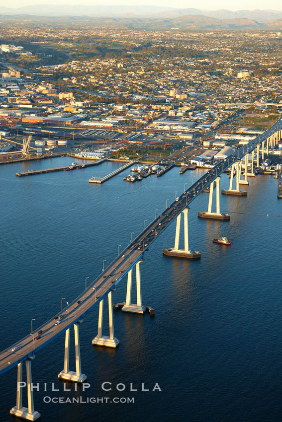 San Diego Coronado Bridge, known locally as the Coronado Bridge, links San Diego with Coronado, California.  The bridge was completed in 1969 and was a toll bridge until 2002.  It is 2.1 miles long and reaches a height of 200 feet above San Diego Bay. USA, natural history stock photograph, photo id 22326