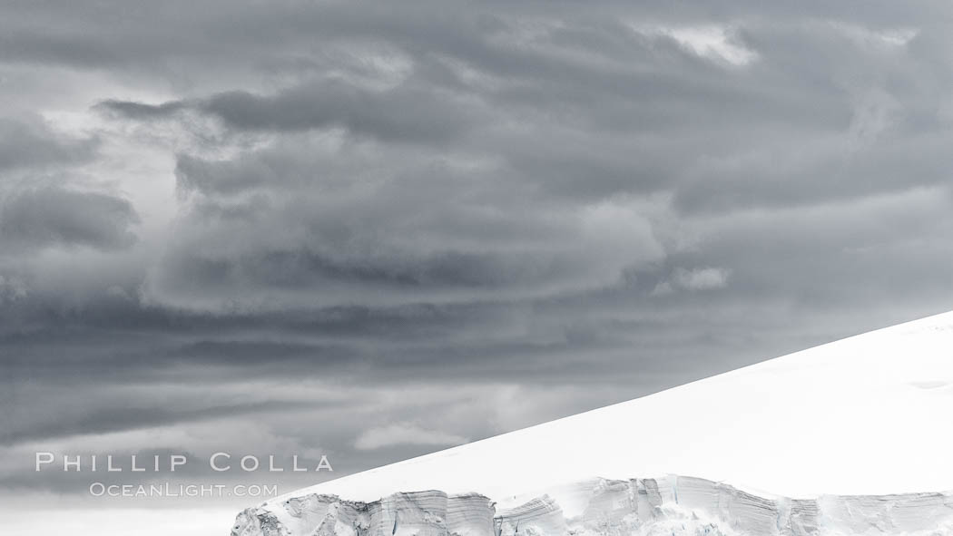 Scenery in Antarctica.  Clouds, ocean and glaciers, near Port Lockroy. Antarctic Peninsula, natural history stock photograph, photo id 25630