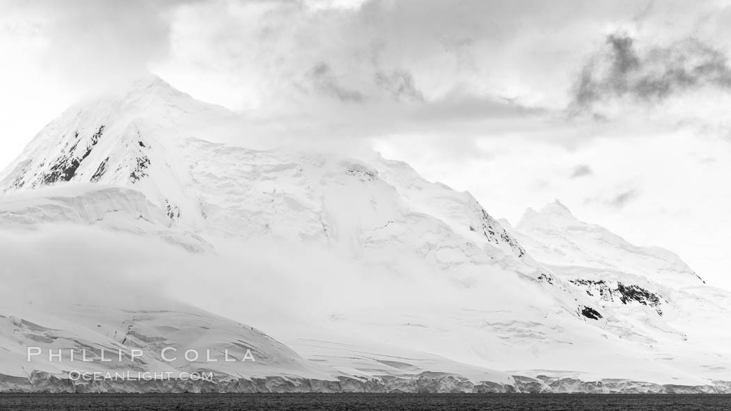 Scenery in Antarctica.  Clouds, ocean and glaciers, near Port Lockroy. Antarctic Peninsula, natural history stock photograph, photo id 25603