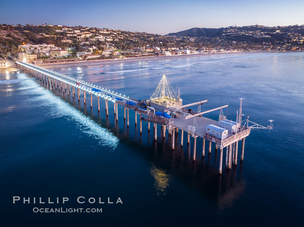 Scripps Pier and Christmas Lights during holiday season, night exposure, La Jolla Coastline, Aerial view, Scripps Institution of Oceanography