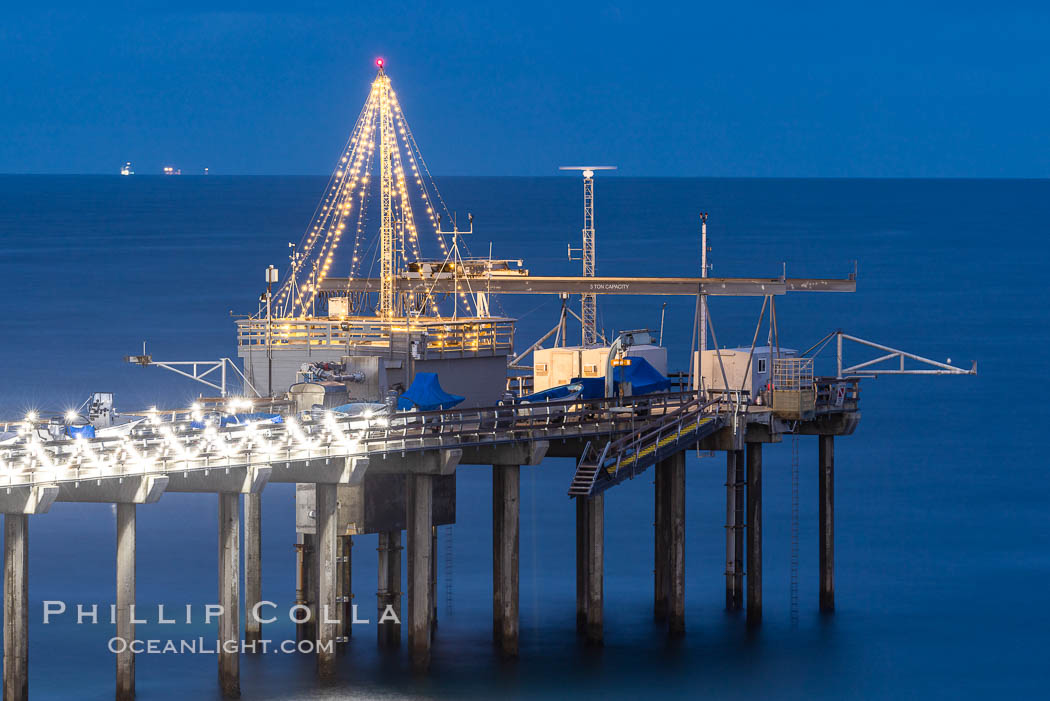 Scripps Institution of Oceanography Research Pier at dawn, with Christmas Lights and Christmas Tree, La Jolla, California