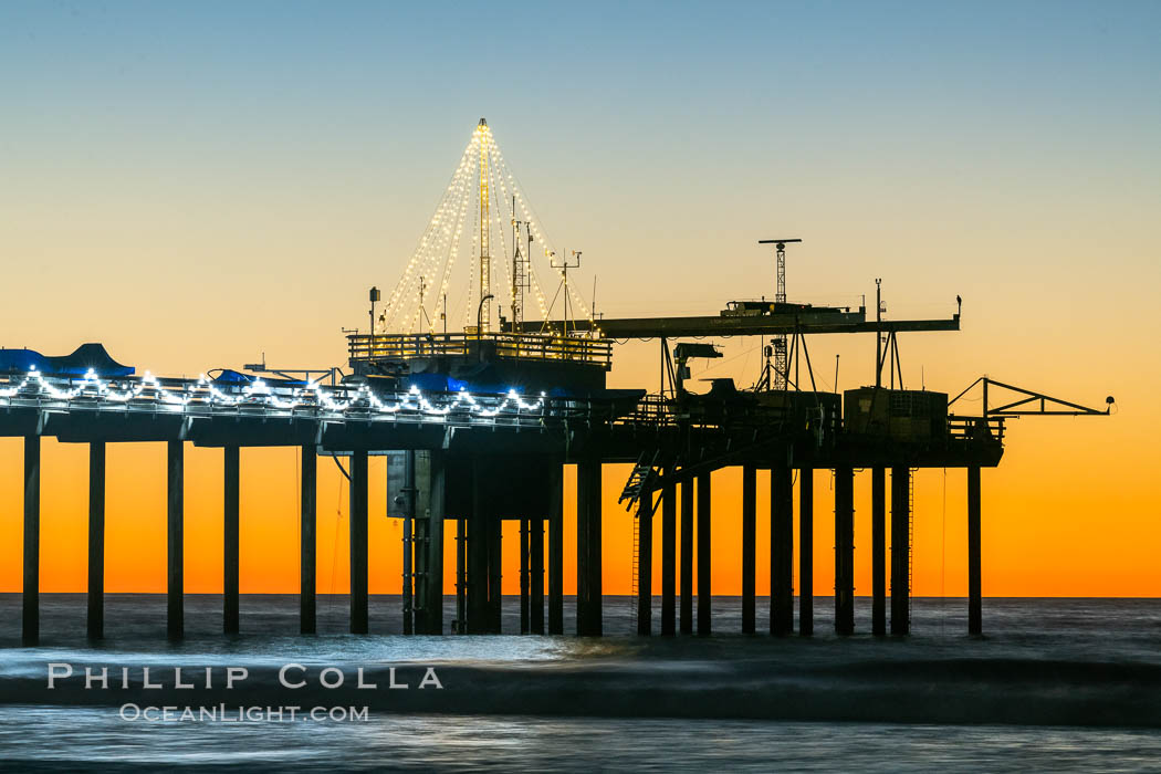 Scripps Institution of Oceanography Research Pier at sunset, with Christmas Lights and Christmas Tree, La Jolla, California