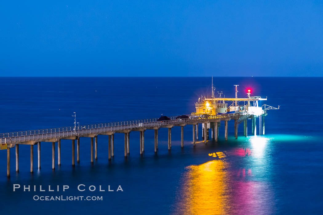 Scripps Institution of Oceanography Research Pier at night, lit with stars in the sky, old La Jolla town in the distance. California, USA, natural history stock photograph, photo id 28453