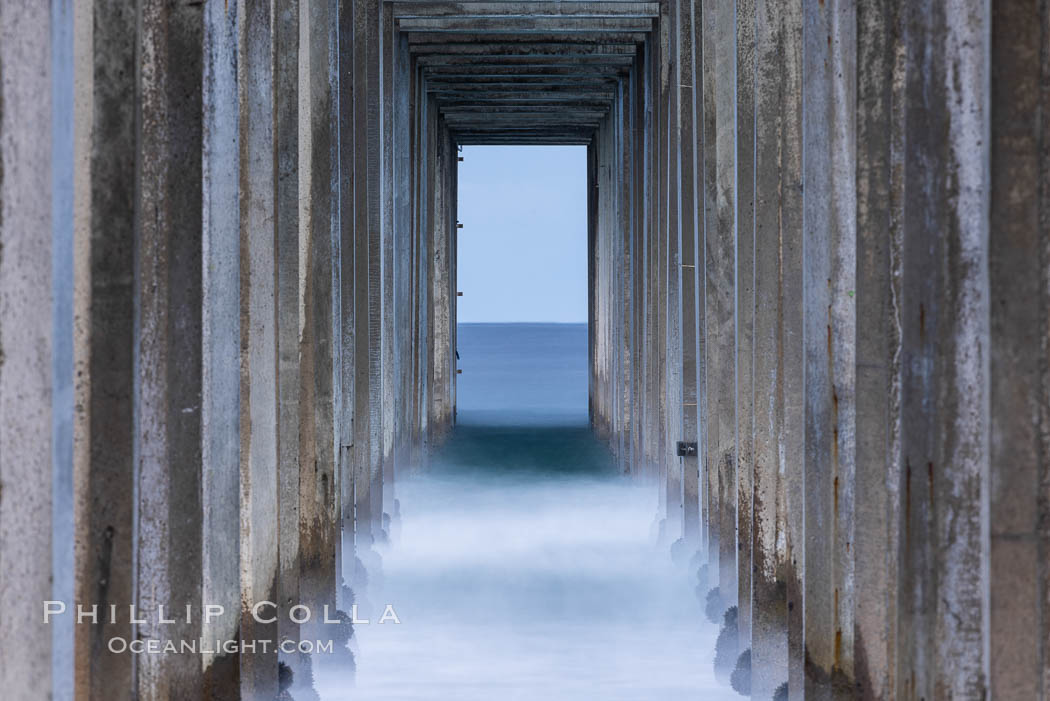 Scripps Pier, predawn abstract study of pier pilings and moving water. Scripps Institution of Oceanography, La Jolla, California, USA, natural history stock photograph, photo id 37555