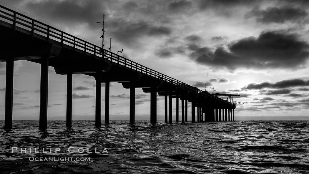 Scripps Pier, Surfer's view from among the waves. Research pier at Scripps Institution of Oceanography SIO, sunset., natural history stock photograph, photo id 30144