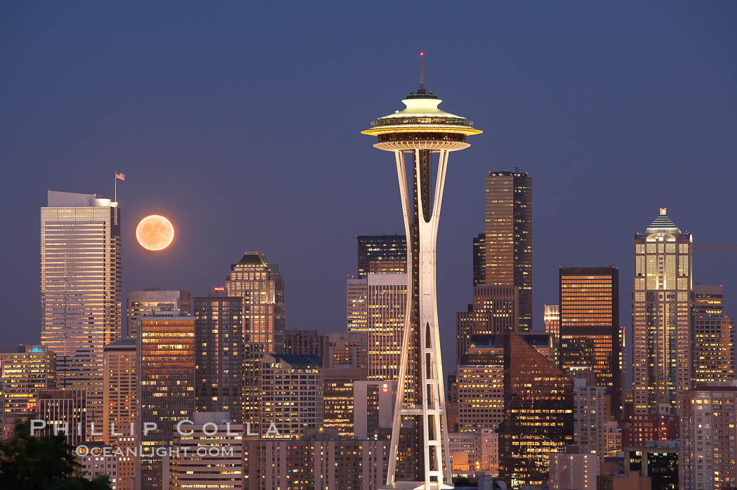 Full moon rises over Seattle city skyline at dusk, Space Needle at right. Washington, USA, natural history stock photograph, photo id 13661