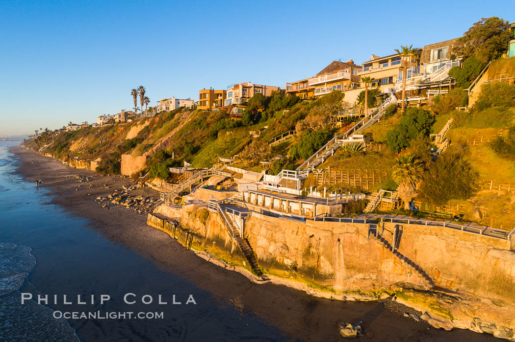 Seawalls and Crumbling Bluffs over the ocean in Encinitas, California. This will all be underwater soon. USA, natural history stock photograph, photo id 38108