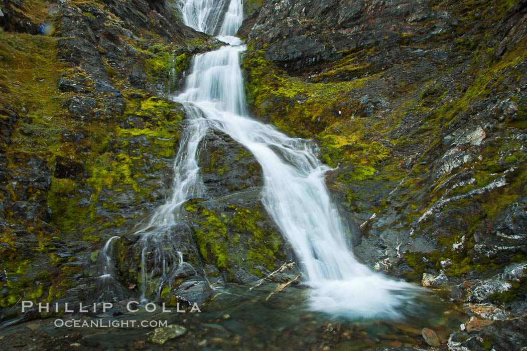 Shackleton Falls, named for explorer Sir Ernest Shackleton, formed from glacial meltwaters, near Stromness Bay. Stromness Harbour, South Georgia Island, natural history stock photograph, photo id 24612