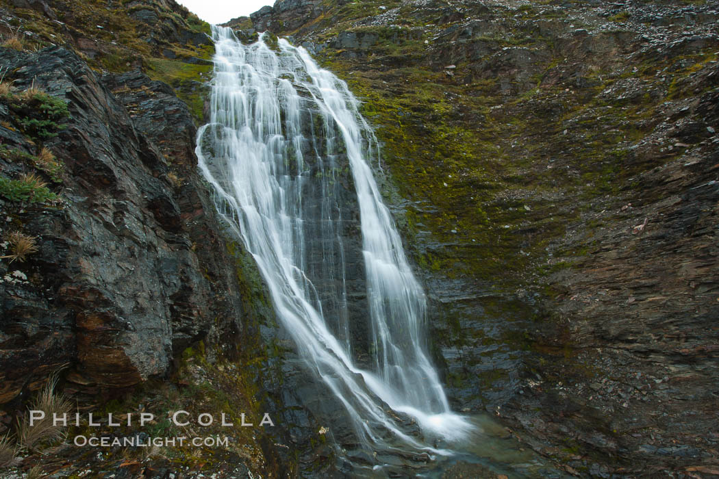 Shackleton Falls, named for explorer Sir Ernest Shackleton, formed from glacial meltwaters, near Stromness Bay. Stromness Harbour, South Georgia Island, natural history stock photograph, photo id 24637