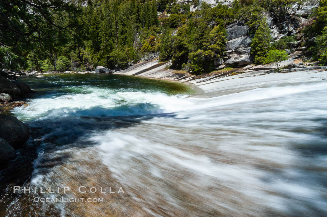 The Merced River tumbles over the Silver Apron into Emerald Pool, just above Vernal Falls.  Unfortunately, a few careless hikers have tried swimming in Emerald Pool only to be swept downstream and plunge over Vernals Falls to their deaths. Yosemite National Park, Spring. California, USA, natural history stock photograph, photo id 09202