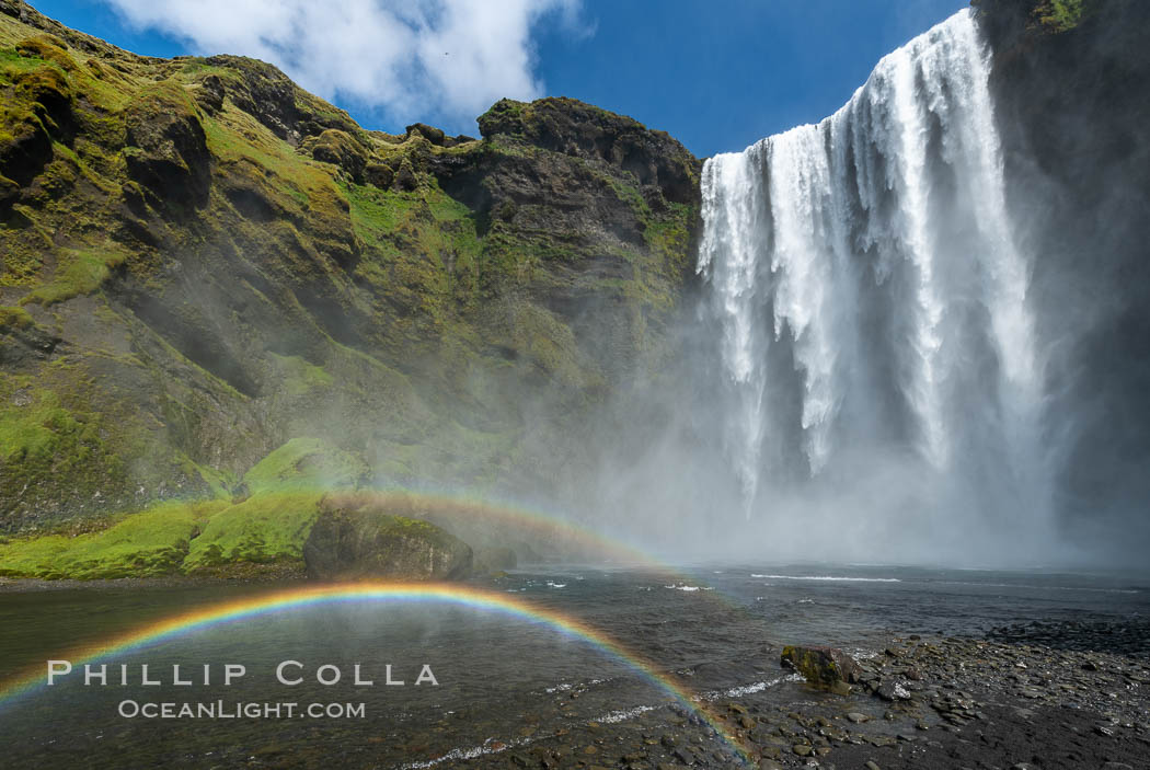 Image 35802, Skogafoss waterfall in Iceland. A double rainbow, full on, all the way. What does it mean?., Phillip Colla, all rights reserved worldwide. Keywords: iceland, skogafoss, waterfall.