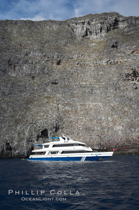 Sky Dancer, a liveaboard dive tour boat, at anchor. Wolf Island, Galapagos Islands, Ecuador, natural history stock photograph, photo id 16695