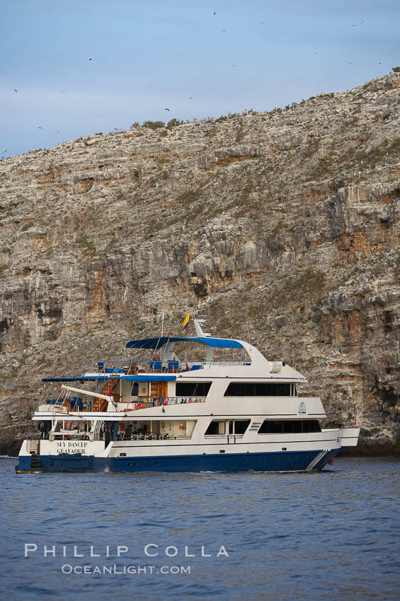 Sky Dancer, a liveaboard dive tour boat, at anchor. Wolf Island, Galapagos Islands, Ecuador, natural history stock photograph, photo id 16699