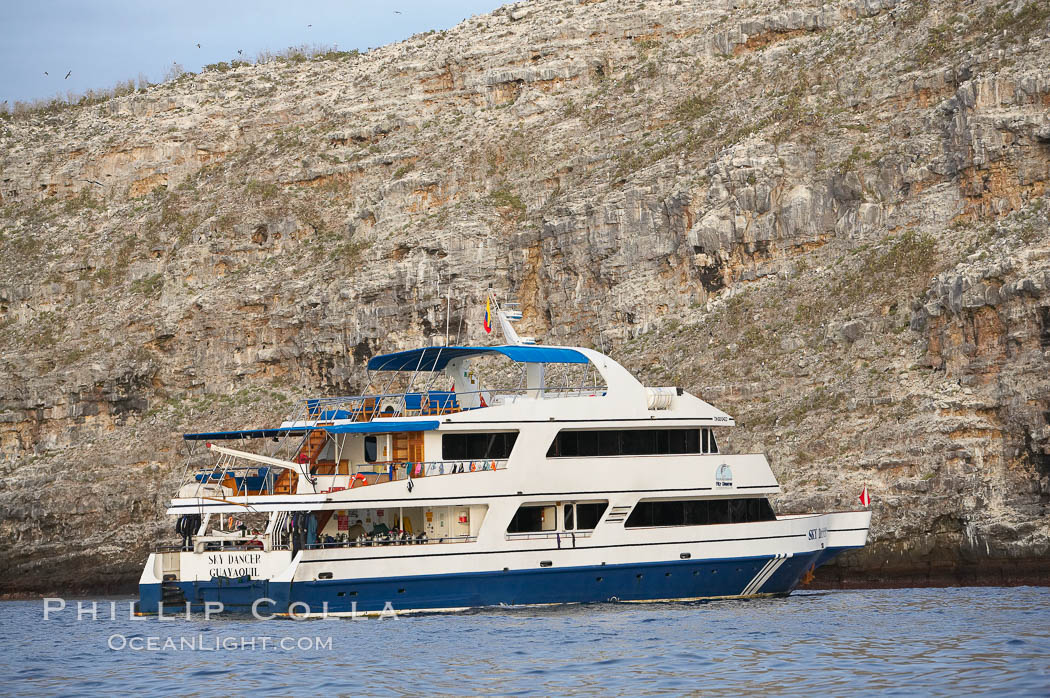 Sky Dancer, a liveaboard dive tour boat, at anchor. Wolf Island, Galapagos Islands, Ecuador, natural history stock photograph, photo id 16693