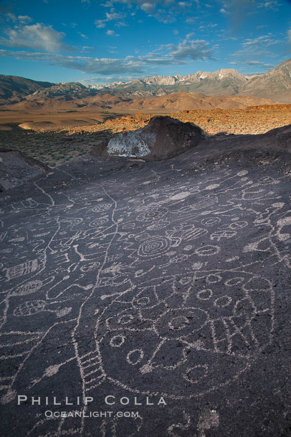 Sky Rock petroglyphs near Bishop, California.  Hidden atop on of the enormous boulders of the Volcanic Tablelands lies Sky Rock, a set of petroglyphs that face the sky.  These superb examples of native American petroglyph artwork are thought to be Paiute in origin, but little is known about them. USA, natural history stock photograph, photo id 27010