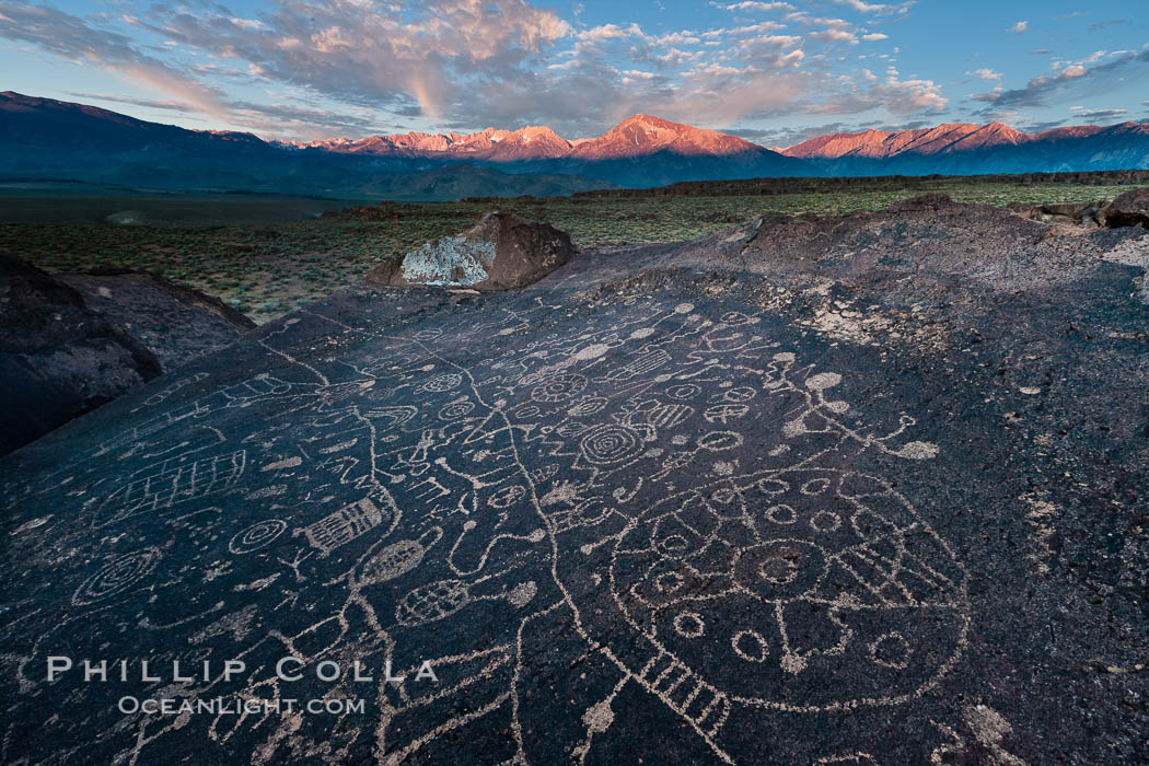 Sky Rock petroglyphs near Bishop, California.  Hidden atop on of the enormous boulders of the Volcanic Tablelands lies Sky Rock, a set of petroglyphs that face the sky.  These superb examples of native American petroglyph artwork are thought to be Paiute in origin, but little is known about them. USA, natural history stock photograph, photo id 27008