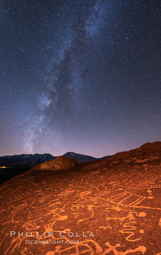 The Milky Way at Night over Sky Rock.  Sky Rock petroglyphs near Bishop, California. Hidden atop an enormous boulder in the Volcanic Tablelands lies Sky Rock, a set of petroglyphs that face the sky. These superb examples of native American petroglyph artwork are thought to be Paiute in origin, but little is known about them. USA, natural history stock photograph, photo id 28806