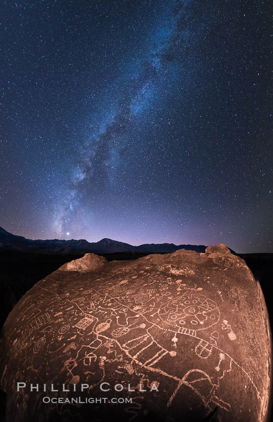 The Milky Way at Night over Sky Rock.  Sky Rock petroglyphs near Bishop, California. Hidden atop an enormous boulder in the Volcanic Tablelands lies Sky Rock, a set of petroglyphs that face the sky. These superb examples of native American petroglyph artwork are thought to be Paiute in origin, but little is known about them. USA, natural history stock photograph, photo id 28804