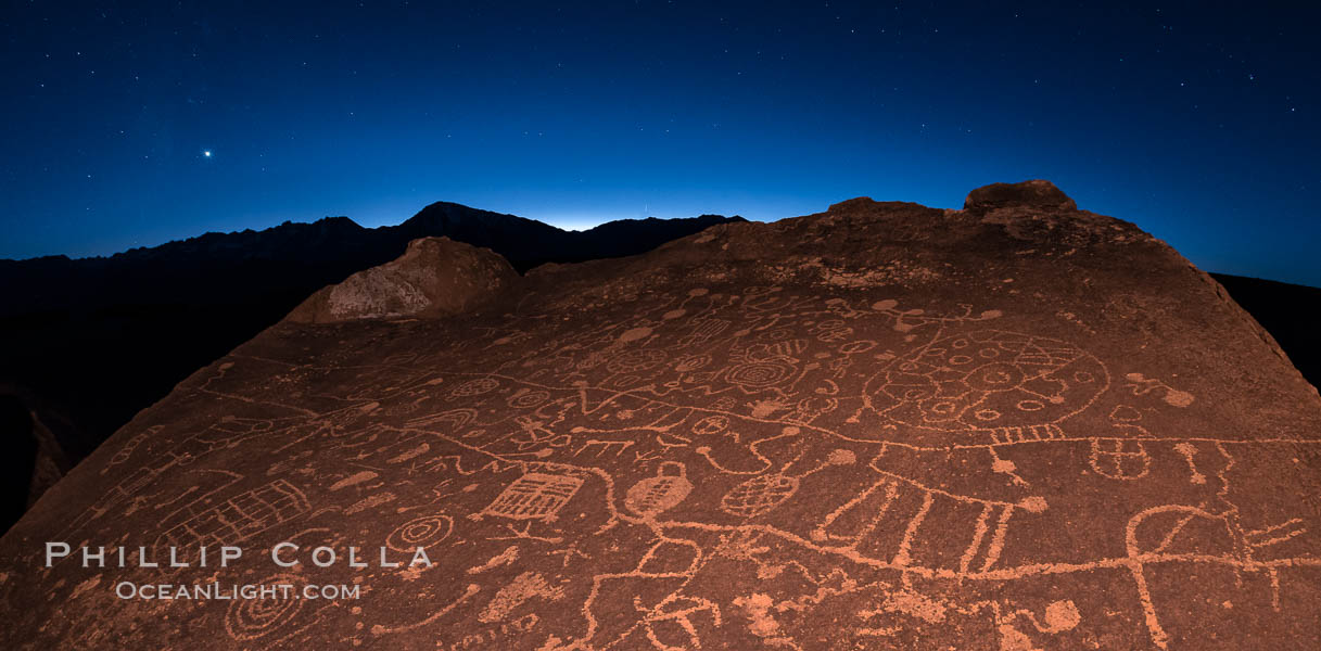 Sunset and stars over Sky Rock.  Sky Rock petroglyphs near Bishop, California. Hidden atop an enormous boulder in the Volcanic Tablelands lies Sky Rock, a set of petroglyphs that face the sky. These superb examples of native American petroglyph artwork are thought to be Paiute in origin, but little is known about them. USA, natural history stock photograph, photo id 28802
