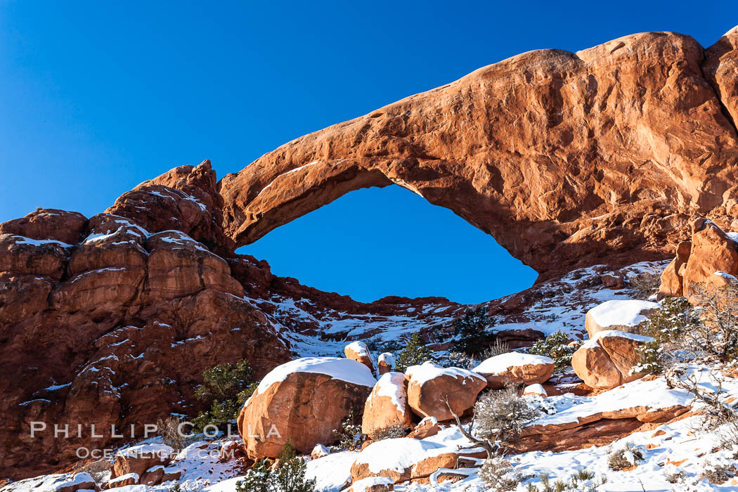 South Window, eastern face, sunrise, winter. Arches National Park, Utah, USA, natural history stock photograph, photo id 18152
