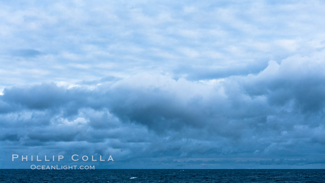 Clouds, weather and light mix in neverending forms over the open ocean of Scotia Sea, in the Southern Ocean., natural history stock photograph, photo id 24762