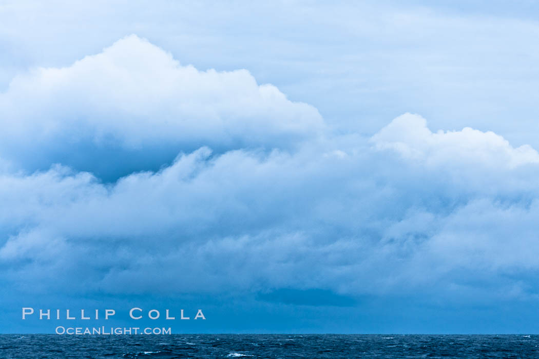 Clouds, weather and light mix in neverending forms over the open ocean of Scotia Sea, in the Southern Ocean., natural history stock photograph, photo id 24776