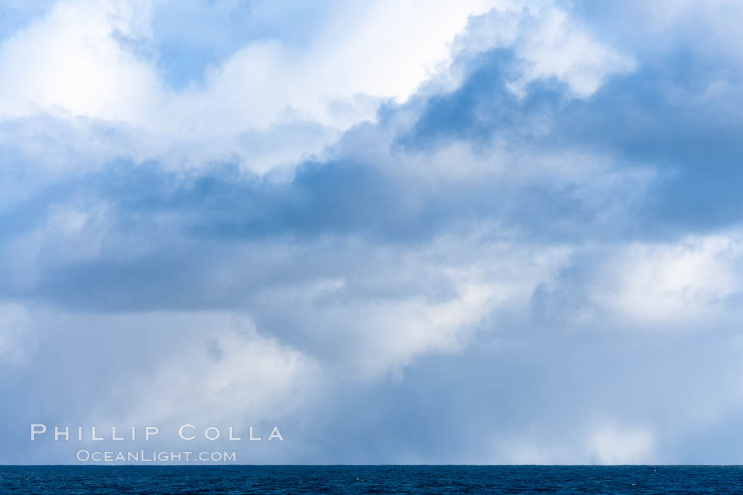 Clouds, weather and light mix in neverending forms over the open ocean of Scotia Sea, in the Southern Ocean., natural history stock photograph, photo id 24767