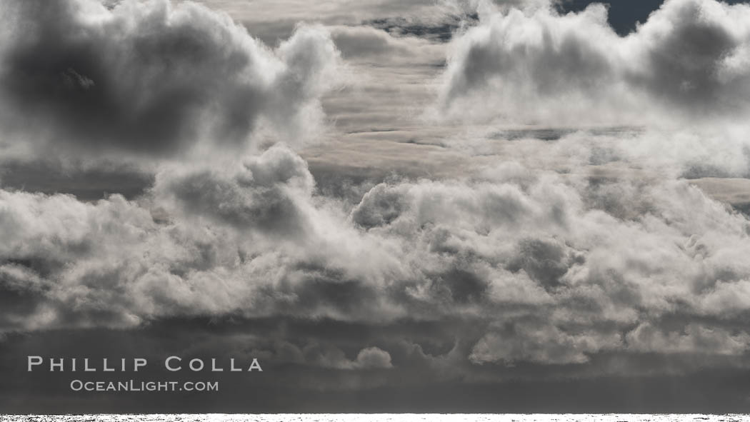 Clouds, weather and light mix in neverending forms over the open ocean of Scotia Sea, in the Southern Ocean., natural history stock photograph, photo id 24761