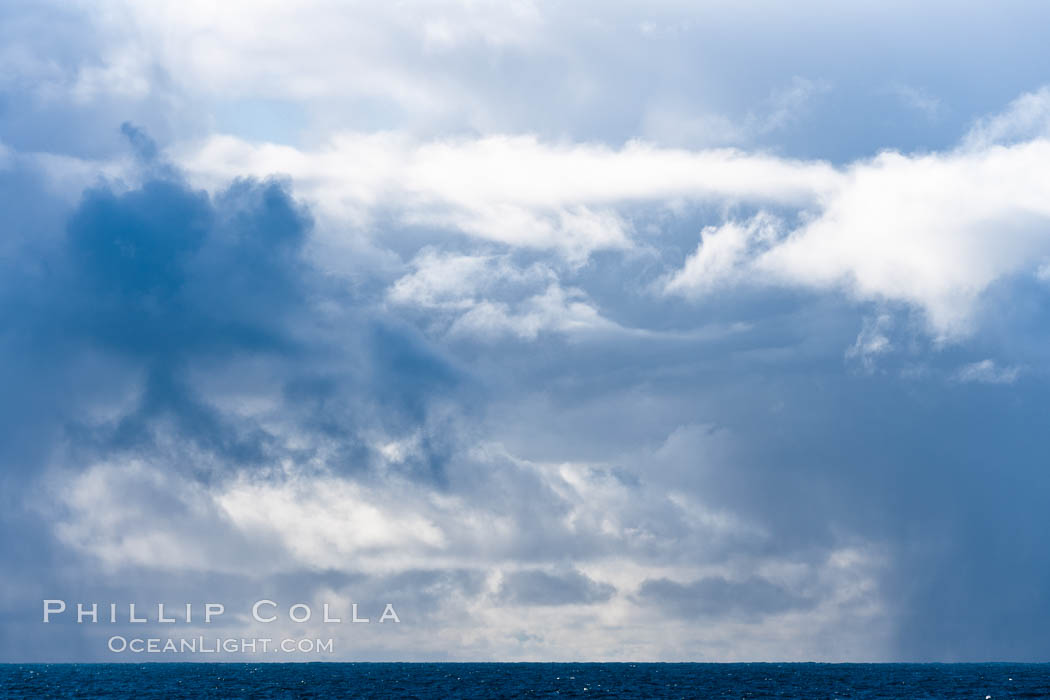 Clouds, weather and light mix in neverending forms over the open ocean of Scotia Sea, in the Southern Ocean., natural history stock photograph, photo id 24765
