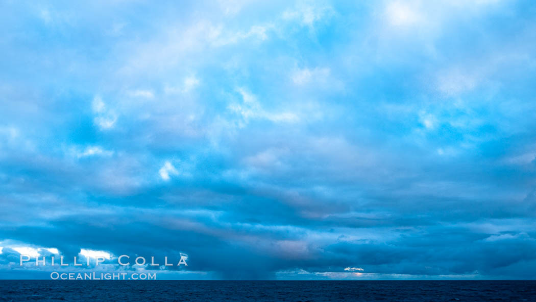 Clouds, weather and light mix in neverending forms over the open ocean of Scotia Sea, in the Southern Ocean., natural history stock photograph, photo id 24777